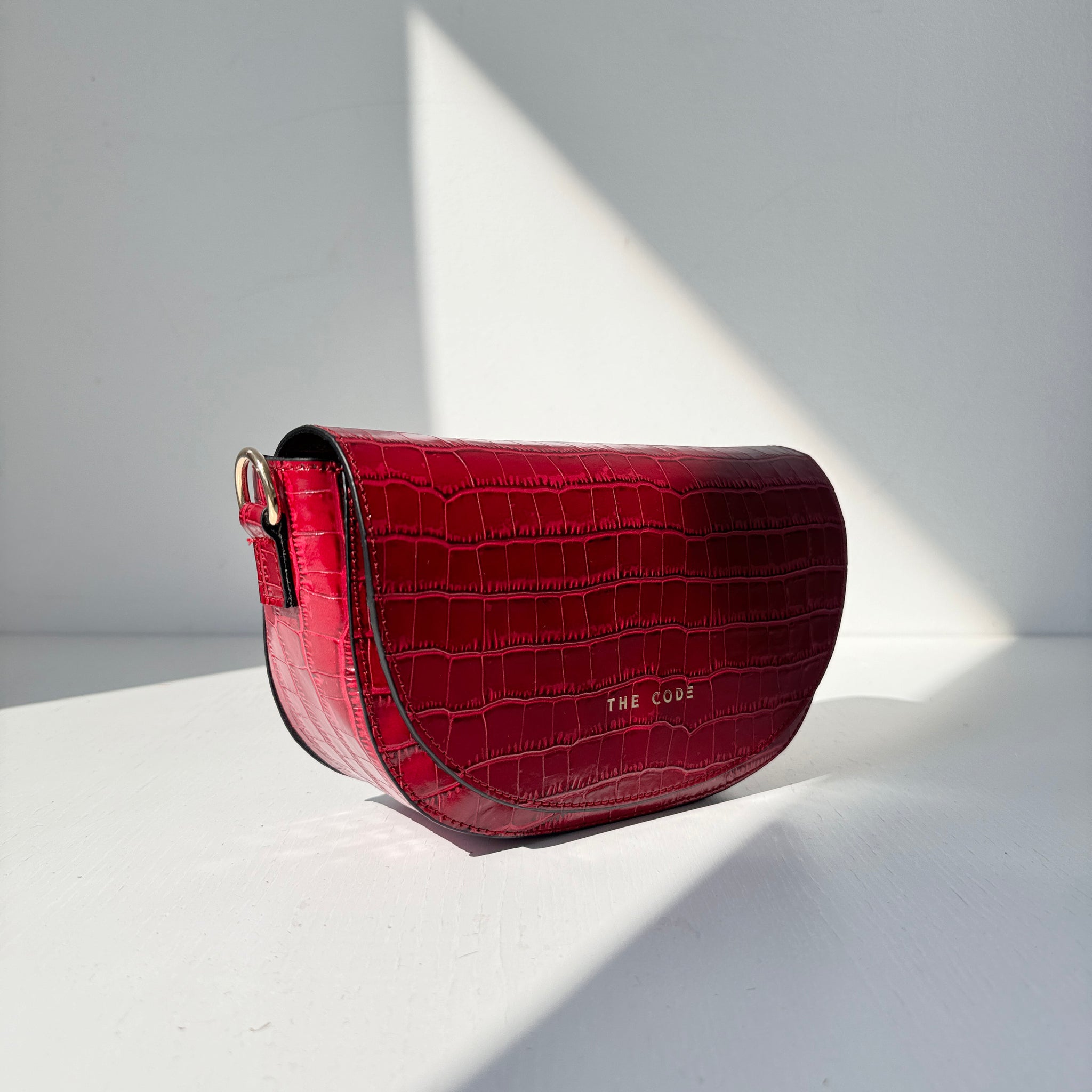 Raspberry Alma leather bag