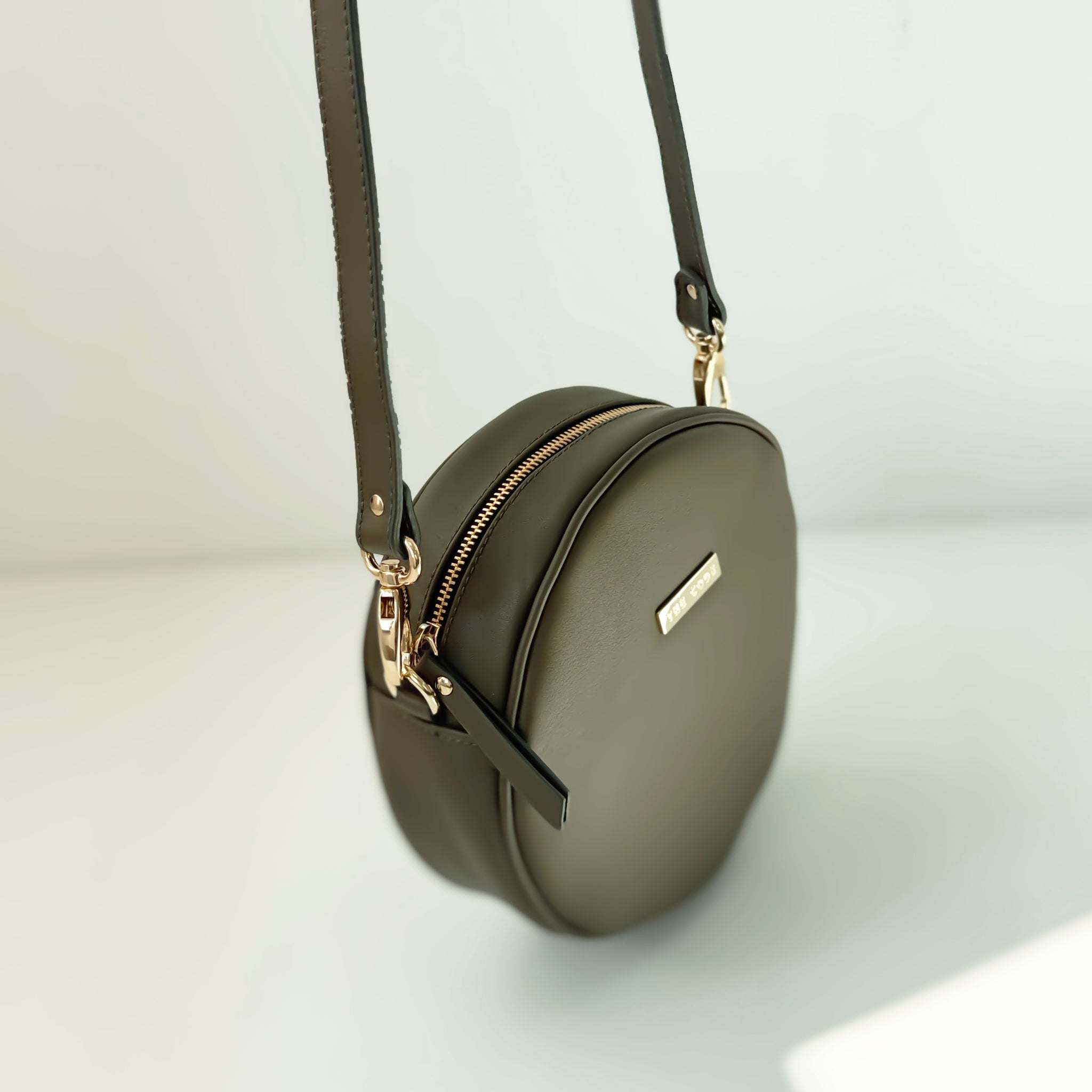 Bandolera Olimpia verde militar liso