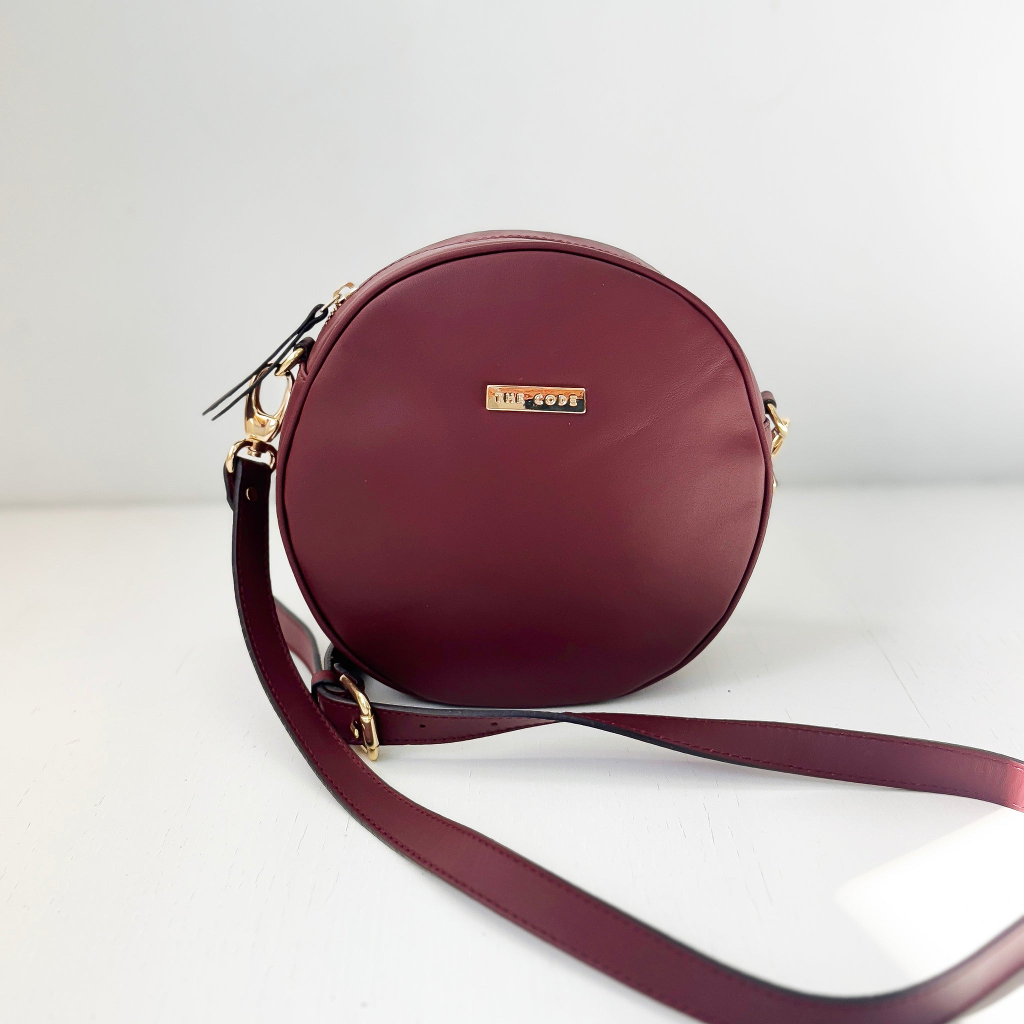 Bandolera Olimpia burdeos liso