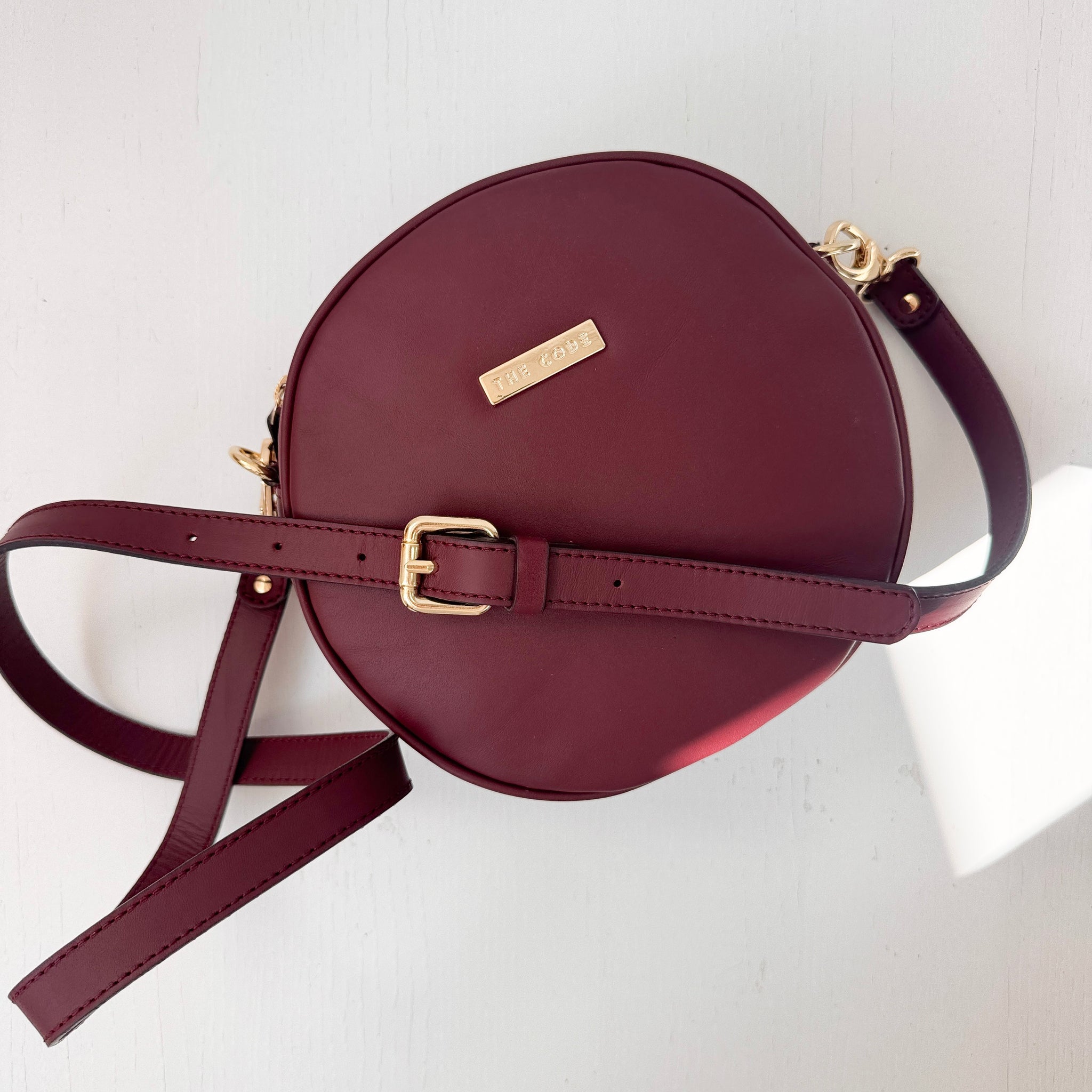 Bandolera Olimpia burdeos liso