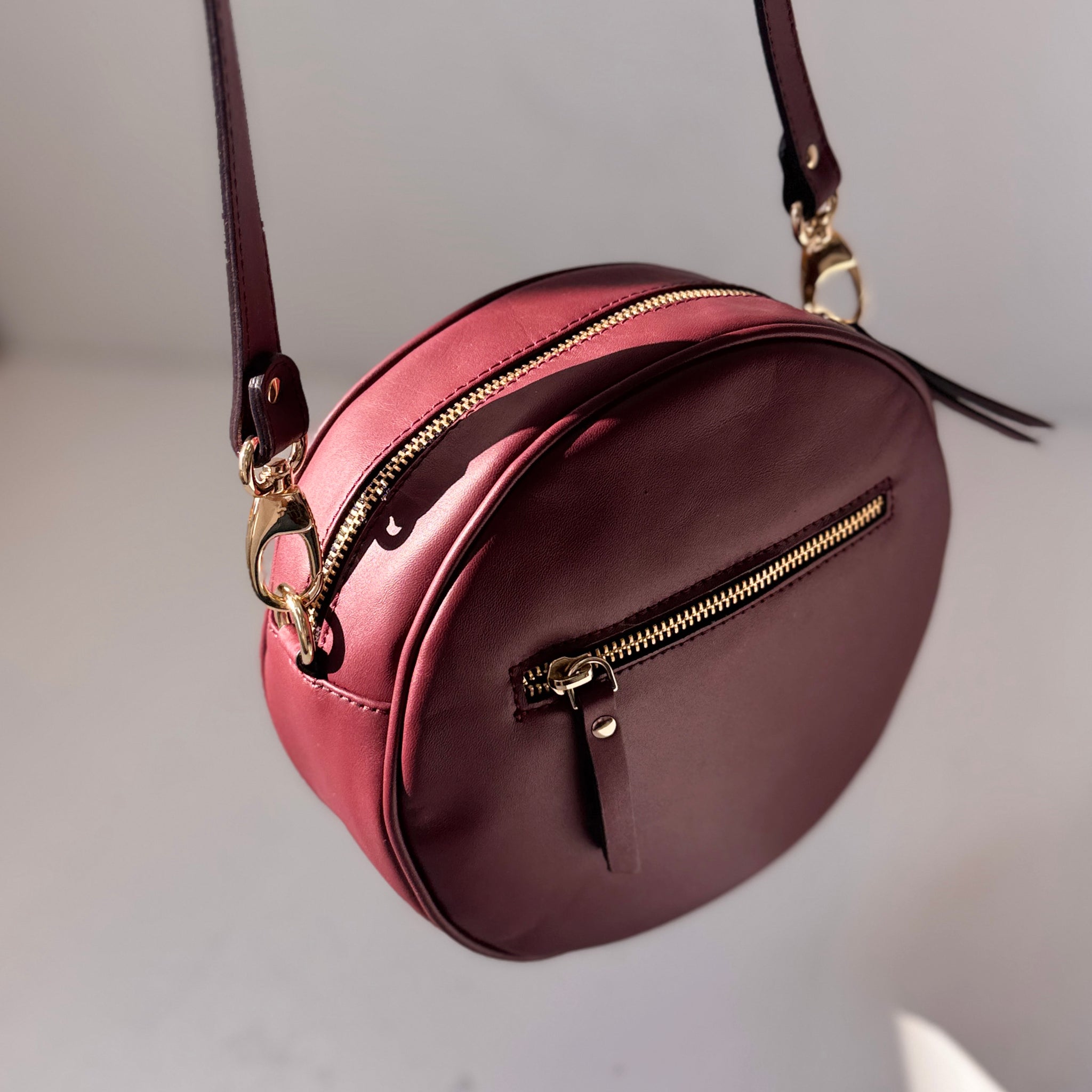 Bandolera Olimpia burdeos liso