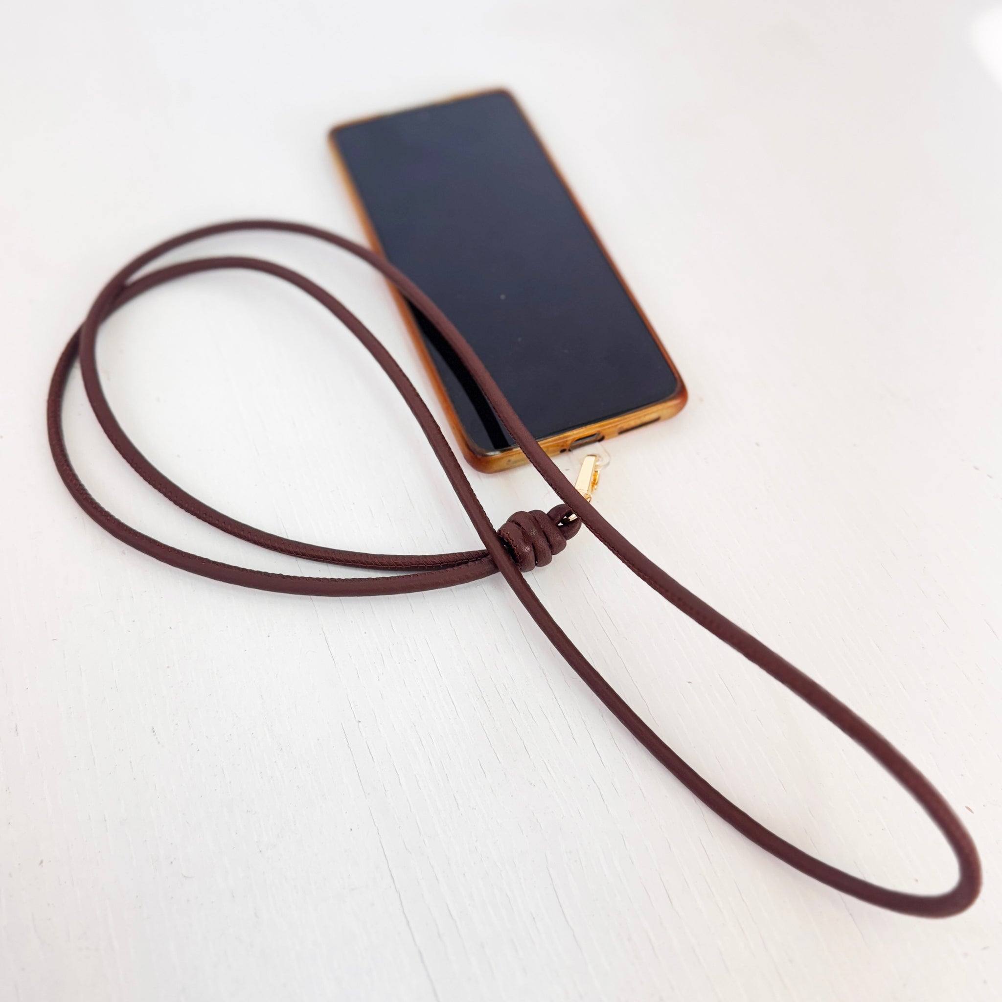 Colgador nudos móvil piel chocolate