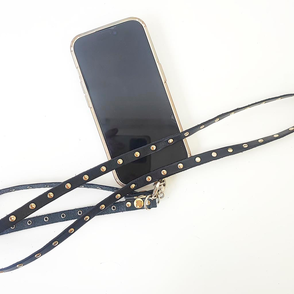 Colgador móvil negro tachas oro