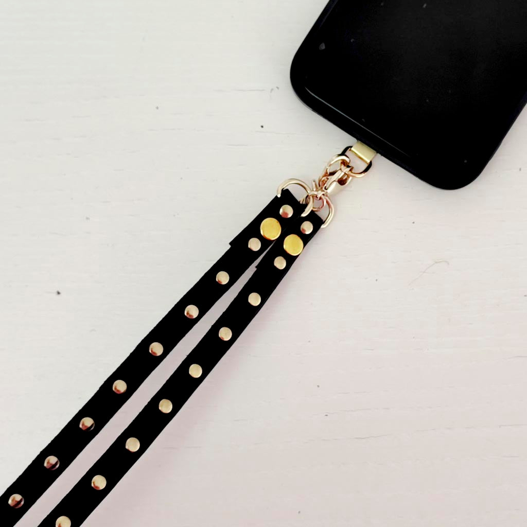 Colgador móvil negro tachas oro