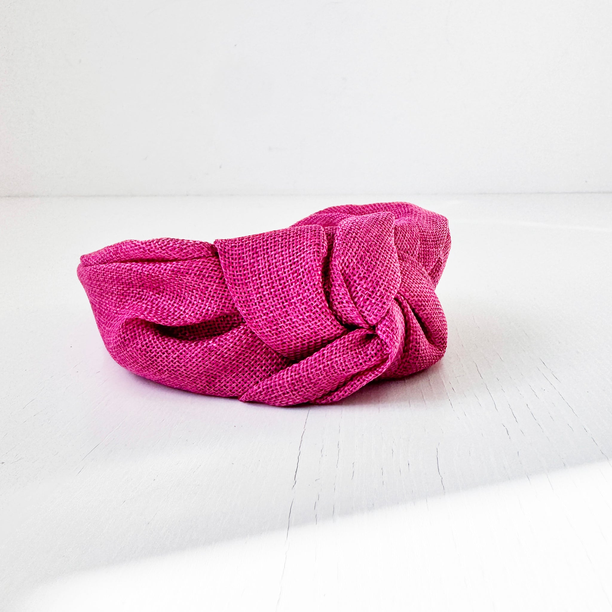 Diadema Atenas rosa fucsia